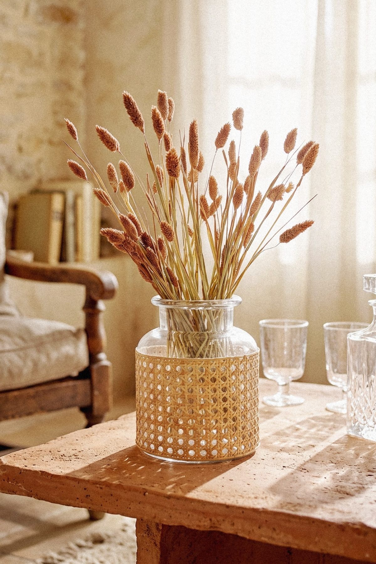 Bring nature inside with Bloomingville glass & cane vase&nbsp;(Denmark)